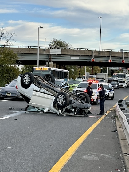 Scene car upside down near I-95